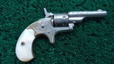 COLT OPEN TOP ENGRAVED SPUR TRIGGER REVOLVER WITH BOX IN CALIBER 22 RF - 1 of 15