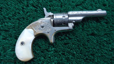 COLT OPEN TOP ENGRAVED SPUR TRIGGER REVOLVER WITH BOX IN CALIBER 22 RF