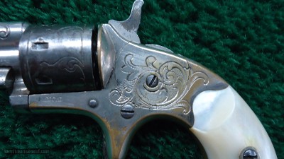 COLT OPEN TOP ENGRAVED SPUR TRIGGER REVOLVER WITH BOX IN CALIBER 22 RF - Image 8 of 15