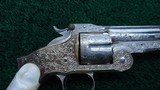 FANTASTIC SMITH & WESSON NIMSCHKE ENGRAVED CASED 2ND MODEL PRESENTATION PISTOL WITH PEARL GRIPS AND RARE SHOULDER STOCK - 9 of 25