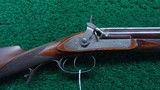 ENGLISH PERCUSSION DOUBLE RIFLE IN ABOUT 60 CALIBER BY E.E. HENNIKER