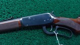WINCHESTER MODEL 94AE LEGACY ROUND BARREL CHECKERED PISTOL GRIP DELUXE CARBINE CHAMBERED IN .357 MAGNUM - 2 of 22