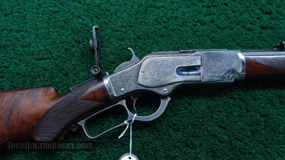 BEAUTIFUL WINCHESTER MODEL 1873 DELUXE FACTORY ENGRAVED RIFLE IN 44 WCF CALIBER