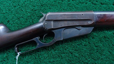 INTERESTING WINCHESTER MODEL 1895 RIFLE IN 35 WCF
