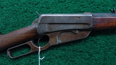 FACTORY ENGRAVED WINCHESTER MODEL 1895 RIFLE IN 38-72 CALIBER