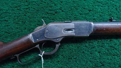 WINCHESTER MODEL 1873 RIFLE WITH 32 INCH OCTAGON BARREL IN 32 WCF