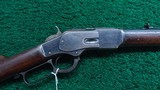 WINCHESTER MODEL 1873 RIFLE WITH 32 INCH OCTAGON BARREL IN 32 WCF - 1 of 24