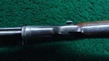 WINCHESTER MODEL 1890 SLIDE ACTION TAKEDOWN RIFLE WITH A-5 SCOPE IN 22 LR - 10 of 24