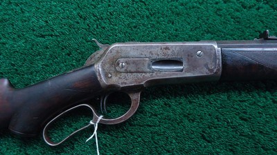 SPECIAL ORDER WINCHESTER 1886 PISTOLGRIP DELUXE RIFLE WITH 30 INCH LIGHTWEIGHT PART OCTAGON BARREL