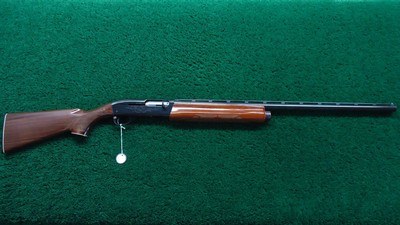 REMINGTON MODEL 1100 12 GAUGE SHOTGUN - Image 24 of 24