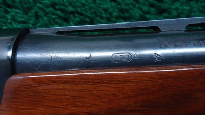 REMINGTON MODEL 1100 12 GAUGE SHOTGUN - Image 14 of 24