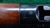 WINCHESTER MODEL 50 SEMI-AUTO SHOTGUN IN 12 GAUGE - 13 of 19