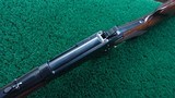 WINCHESTER MODEL 94AE LEGACY ROUND BARREL CHECKERED PISTOL GRIP DELUXE CARBINE CHAMBERED IN .357 MAGNUM - 4 of 22