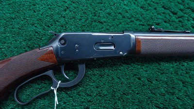 WINCHESTER MODEL 94AE LEGACY ROUND BARREL CHECKERED PISTOL GRIP DELUXE CARBINE CHAMBERED IN .357 MAGNUM