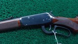 WINCHESTER MODEL 94AE LEGACY ROUND BARREL CHECKERED PISTOL GRIP DELUXE CARBINE CHAMBERED IN .357 MAGNUM - 2 of 22