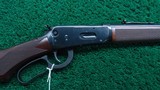WINCHESTER MODEL 94AE LEGACY ROUND BARREL CHECKERED PISTOL GRIP DELUXE CARBINE CHAMBERED IN 30 WIN