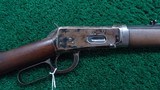 WINCHESTER MODEL 1894 LEVER ACTION TAKEDOWN RIFLE CHAMBERED IN 30 WCF - 1 of 23