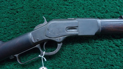 WINCHESTER MODEL 1873 RIFLE IN 32 WCF CALIBER - Image 1 of 25