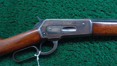 WINCHESTER MODEL 1886 RIFLE IN 45-70 CALIBER - Image 1 of 24