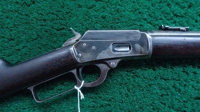 MARLIN MODEL 94 SADDLE RING CARBINE IN CALIBER 38-40 - Image 1 of 22