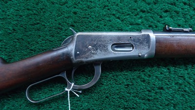 WINCHESTER MODEL 94 SADDLE RING CARBINE IN CALIBER 25-35 WCF - Image 1 of 23