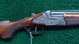 FACTORY ENGRAVED GAME SCENE OVER/UNDER AUSTRIAN 12 GAUGE SHOTGUN - Image 1 of 25