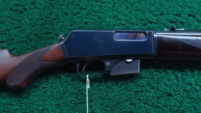 FIRST YEAR WINCHESTER DELUXE MODEL 1910 S.L. SEMI-AUTO RIFLE IN 401 CAL - Image 1 of 24