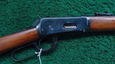 WINCHESTER MODEL 94 SADDLE RING CARBINE IN CALIBER 38-55 - Image 1 of 25