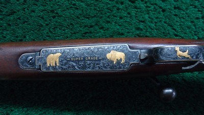 CUSTOM ENGRAVED WINCHESTER MODEL 70 RIFLE IN CALIBER .257 ROBERTS - Image 9 of 25