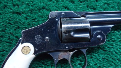 SMITH & WESSON SAFETY HAMMERLESS REVOLVER IN CALIBER 38 S & W WITH BOX - Image 6 of 18