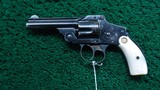 SMITH & WESSON SAFETY HAMMERLESS REVOLVER IN CALIBER 38 S & W WITH BOX - Image 2 of 18