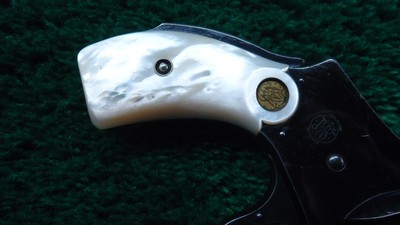 SMITH & WESSON SAFETY HAMMERLESS REVOLVER IN CALIBER 38 S & W WITH BOX - Image 11 of 18
