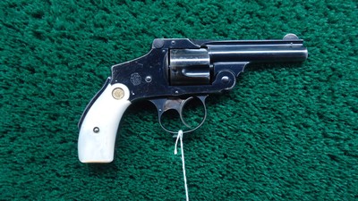 SMITH & WESSON SAFETY HAMMERLESS REVOLVER IN CALIBER 38 S & W WITH BOX - Image 1 of 18