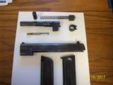 Colt Ace Complete Slide Assembly Very early 1936-1937 Solid Barrel. 2 Magazines.
- 1 of 1