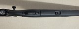Savage model 11 bolt action rifle with 3-9x40 Nikon Prostaff BDC - 5 of 7