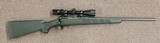 Savage model 11 bolt action rifle with 3-9x40 Nikon Prostaff BDC - 1 of 7