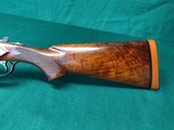 Winchester Model 21, 16 gauge, 28" barrels, pistol grip, beavertail, single trigger, deluxe wood - 3 of 7