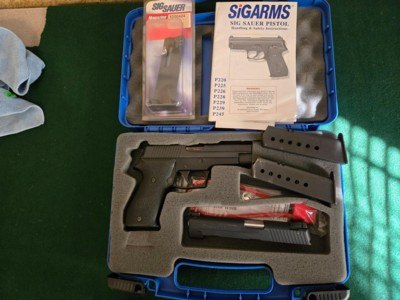 Sig Sauer P220 45 ACP with a new rare Sig Sauer 22lr conversion unit