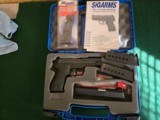 Sig Sauer P220 45 ACP with a new rare Sig Sauer 22lr conversion unit