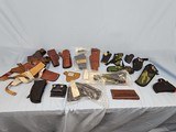 LARGE LOT OF HOLSTERS - 1 of 1