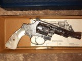 Smith & Wesson Model 651 22 WMR Stainless engraved w box - 3 of 14