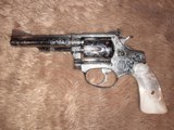 Smith & Wesson Model 651 22 WMR Stainless engraved w box - 7 of 14