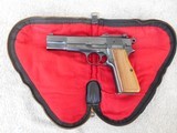 Manufactured in Belgium, this Browning Hi Power with tangent sight in 9 mm manufactured in 1966 is in at least very good+ to excellent condition. - 20 of 20