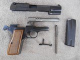 Manufactured in Belgium, this Browning Hi Power with tangent sight in 9 mm manufactured in 1966 is in at least very good+ to excellent condition. - 6 of 20