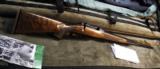 REMINGTON MODEL 547 CUSTOM C GRADE , 22WMR,22" BL, NEW WITH CASE - 1 of 4