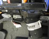 SIG SAUER M11-A1 25TH ANNIVERSARY, BRAND NEW
(M11-A1-25TH) - 2 of 2