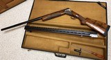 PERAZZI MX8 TRAP COMBO ITHACA MODEL 32" O/U AND 34" TOP SINGLE, CASED - 1 of 11