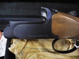 PERAZZI MX10RS TRAP COMBO, 3 NOTCHES, 12GA 34" UNSINGLE & 31 1/2" O/U, NEW, CASED - 4 of 8