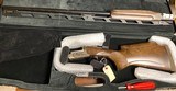 PERAZZI HIGH TECH RS TRAP 12GA 34" UNSINGLE, BRAND NEW, CASED - 1 of 5