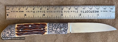 TOZAKIS FOLDING KNIFE AMBER STAG, BRAND NEW